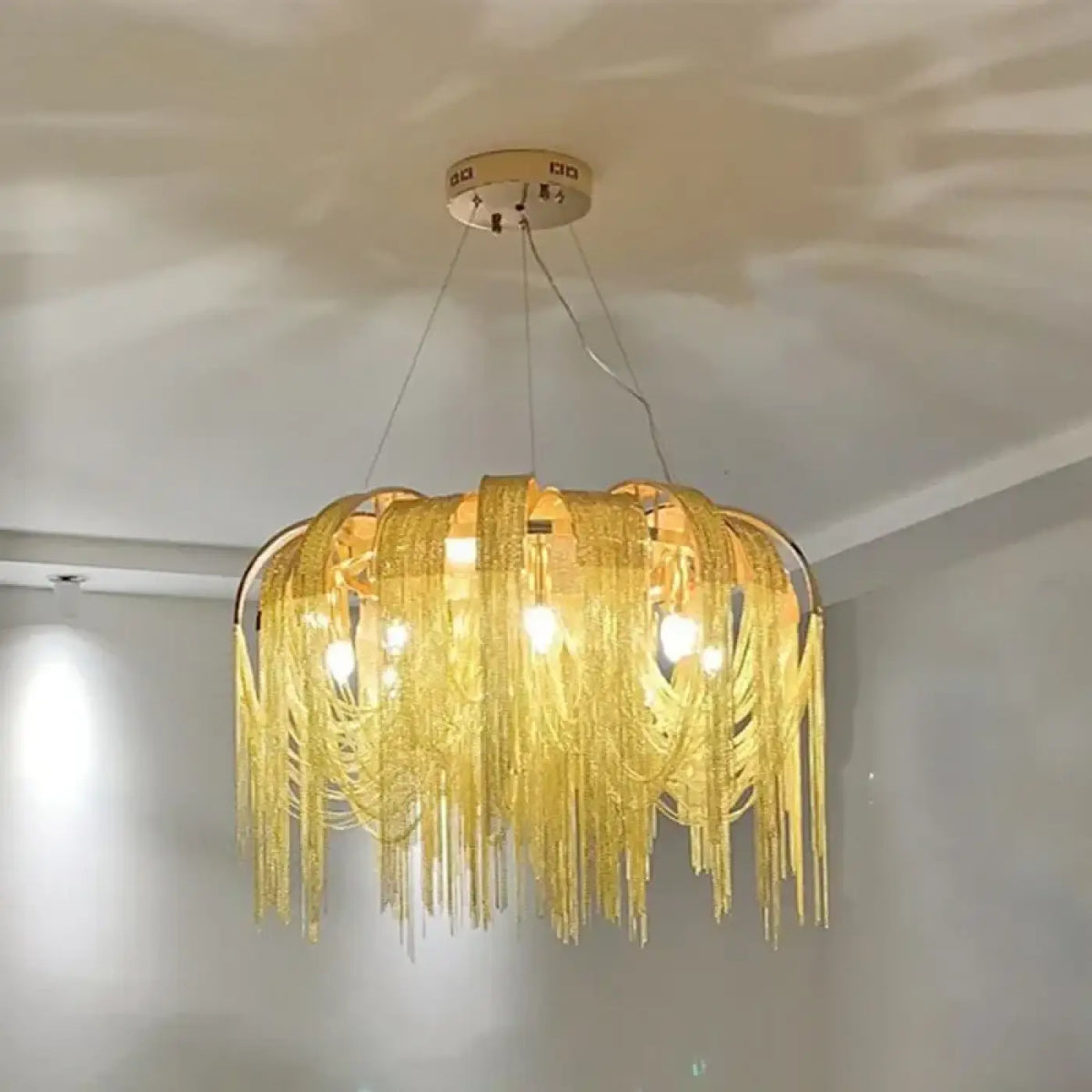 Lustre Suspendu à Franges Dorées | Gata